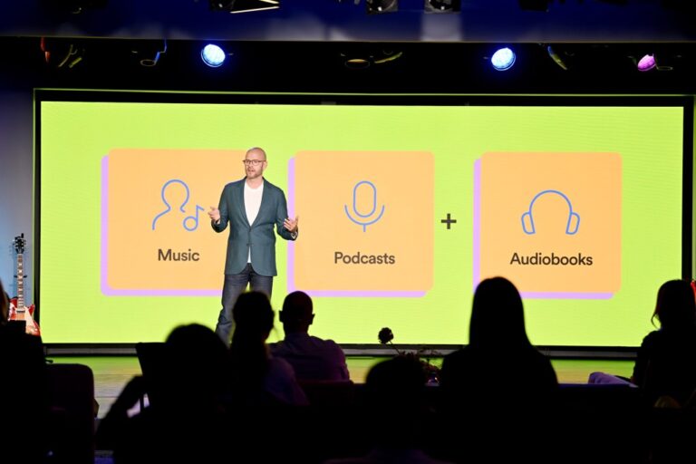 Spotify Teams With Netflix on Podcasts, Touts Audiobook Listener Gains Spotify Teams With Netflix on Podcasts, Touts Audiobook Listener Gains